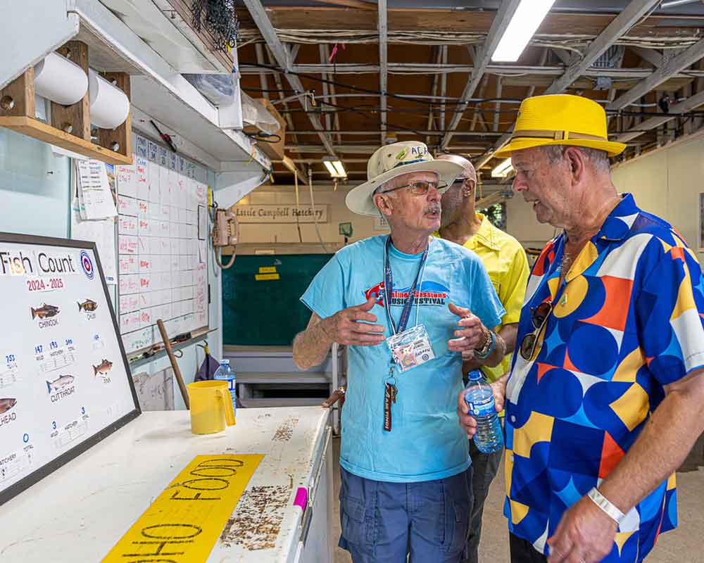 lch-volunteer-speaking-with-guest